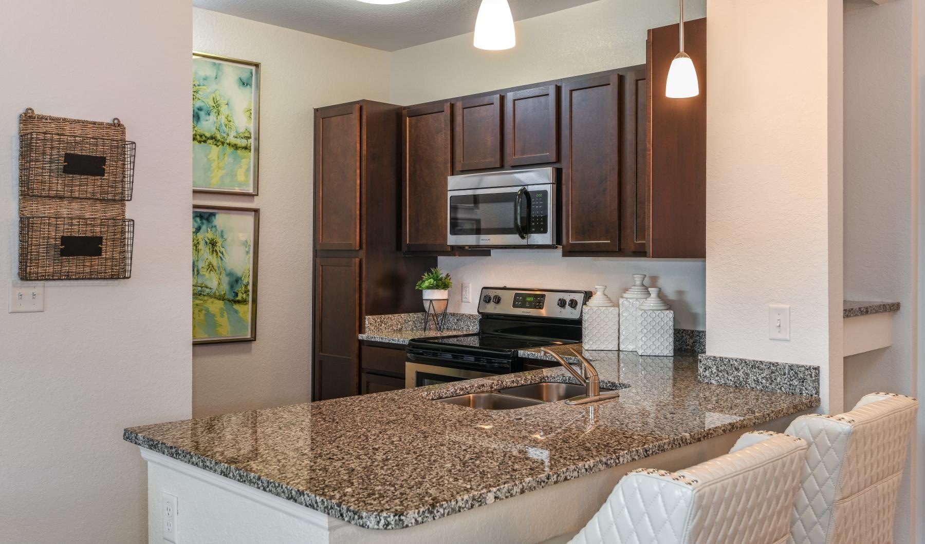 a kitchen with seating